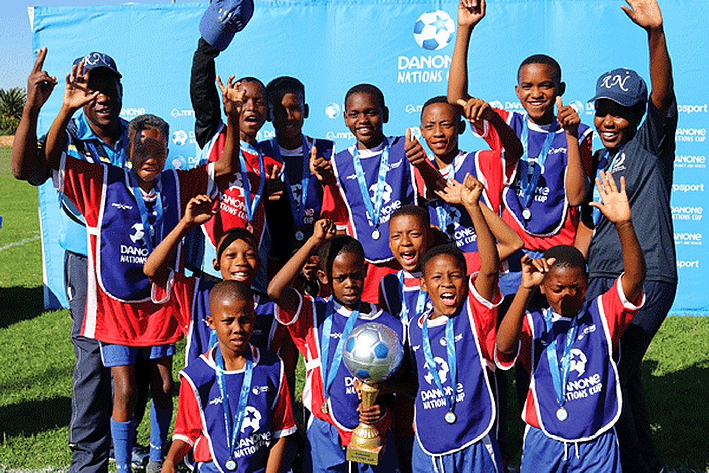 Nories celebrating with their trophy at the Danone Nations Cup National Finals